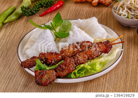 Tasty asian grilled pork skewer Tasty asian grilled pork skewer 136419829