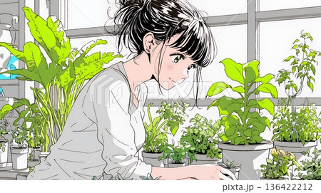 観葉植物の世話をする若い女性