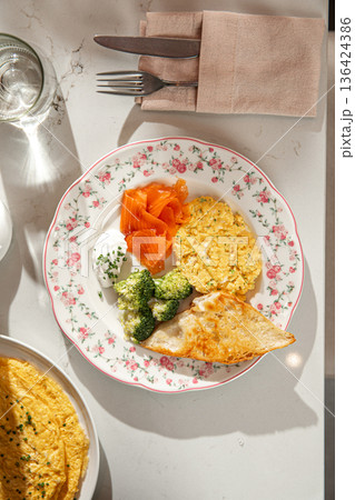 Scrambled eggs with salmon and broccoli Scrambled eggs with salmon and broccoli 136424386