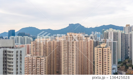 Amoy Plaza residential towers rise against distant mountain backdrop Feb 8 2026 136425028