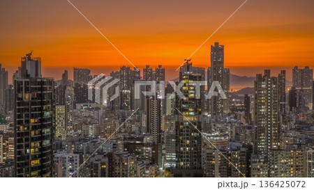 Golden sunset illuminates dense Kowloon West urban skyline Feb 6 2026 Golden sunset illuminates dense Kowloon West urban skyline Feb 6 2026 136425072