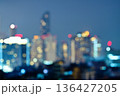 Abstract blurred background cityscape of Krung Thep Maha Nakhon (Bangkok) on night scene with multicolour bokeh from neon light on building  136427205