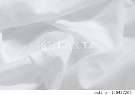 Soft focus white smooth ripple linen fabric on detail texture background Soft focus white smooth ripple linen fabric on detail texture background 136427207