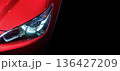 Close-up LED xenon headlight on red new modern car  136427209