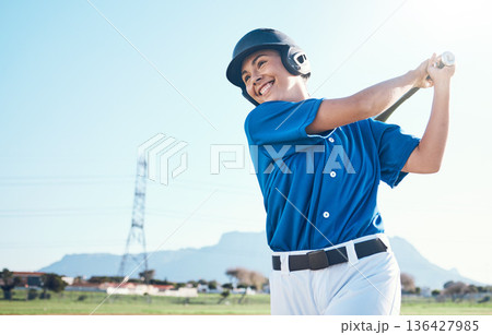 Baseball, bat and swing of a woman outdoor on a pitch for sports, performance and competition. Professional athlete or softball player with a smile, space and ready for game, training or exercise 136427985