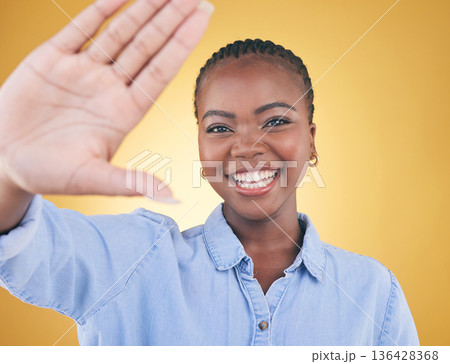 Selfie, smile and portrait of black woman in studio for motivation, social media and influencer. Happy, freedom and profile picture with face of person on yellow background for post and happiness Selfie, smile and portrait of black woman in studio for motivation, social media and influencer. Happy, freedom and profile picture with face of person on yellow background for post and happiness 136428368