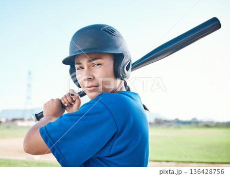 Baseball, portrait and a person with bat outdoor on pitch for sports performance or competition. Professional athlete or softball woman for swing, commitment or fitness for game, training or exercise Baseball, portrait and a person with bat outdoor on pitch for sports performance or competition. Professional athlete or softball woman for swing, commitment or fitness for game, training or exercise 136428756