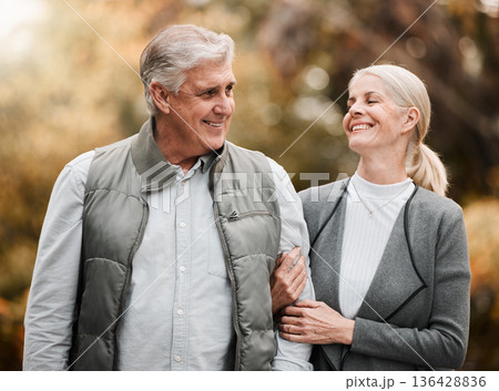Happy, love and peace with old couple in nature for bonding, relax and support. Smile, happiness and retirement with senior man and woman walking in countryside park for vacation and commitment Happy, love and peace with old couple in nature for bonding, relax and support. Smile, happiness and retirement with senior man and woman walking in countryside park for vacation and commitment 136428836