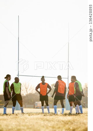 Rugby, training and men on field for motivation at game, match or practice workout together. Sports, fitness and team at poles on grass with energy, talent and inspiration for winning at challenge. Rugby, training and men on field for motivation at game, match or practice workout together. Sports, fitness and team at poles on grass with energy, talent and inspiration for winning at challenge. 136428893