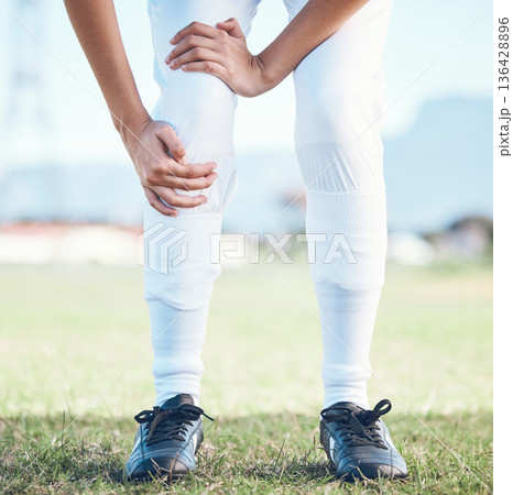 Knee pain, fitness and sports person with legs injury from baseball challenge, grass field workout or exercise. Medical emergency or problem, training accident and closeup athlete with muscle strain 136428896
