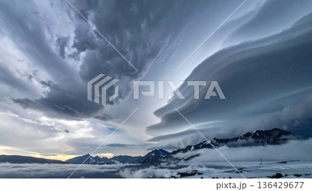 Dramatic storm clouds loom over a dark horizon...のイラスト素材 [136429677 ...