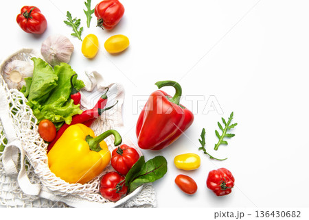 Fresh organic vegetables in mesh shopping bag 136430682