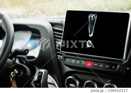 Exclamation mark light painting on car interior screen Exclamation mark light painting on car interior screen 136432517