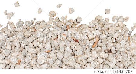 Small white stones are seen scattered on a white background. These stones have different shapes and sizes, providing a natural look for various projects or designs Small white stones are seen scattered on a white background. These stones have different shapes and sizes, providing a natural look for various projects or designs 136435707