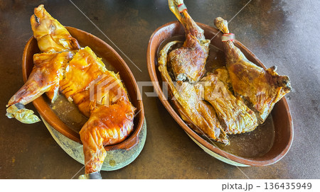 Traditional Segovian Style Roast Suckling Pig and Lamb 136435949