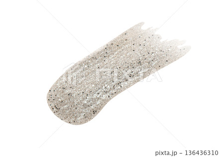 A sample of silver nail polish with a shimmer and metallic effect. Isolated on a white background. A sample of silver nail polish with a shimmer and metallic effect. Isolated on a white background. 136436310