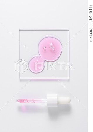 A skin serum or a moisturizing gel or a face wash gel. Cosmetic product. White background. A skin serum or a moisturizing gel or a face wash gel. Cosmetic product. White background. 136436313
