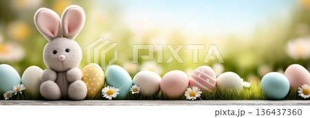 Cute bunny celebrating Easter with colorful spring eggs. Easter wallpaper. Fluffy bunny sitting among pastel Easter eggs on grass with soft spring background Cute bunny celebrating Easter with colorful spring eggs. Easter wallpaper. Fluffy bunny sitting among pastel Easter eggs on grass with soft spring background 136437360