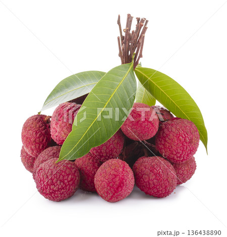 Fresh lychees and leaves isolated on a white background Fresh lychees and leaves isolated on a white background 136438890