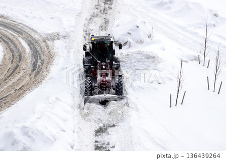 Rural road snow clearing efforts. Maintaining rural roads by removing snow and ensuring safety Rural road snow clearing efforts. Maintaining rural roads by removing snow and ensuring safety 136439264