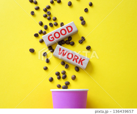 Good work symbol. Concept words Good work on beautiful wooden picture frame. Beautiful yellow background with coffee cup and coffee beans. Business and Good work concept. Copy space. 136439657