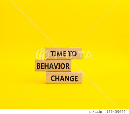 Behavior Change symbol. Wooden blocks with words Time to Behavior Change. Beautiful yellow background. Business and Behavior Change concept. Copy space. 136439665