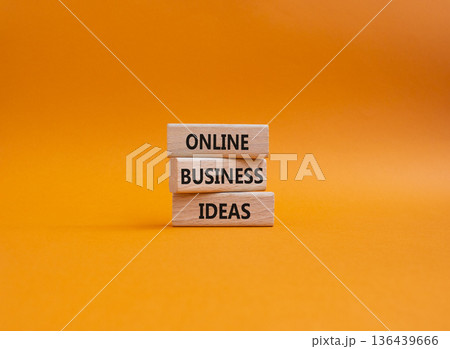 Online Business Ideas symbol. Wooden blocks with words Online Business Ideas. Beautiful orange background. Business and Online Business Ideas concept. Copy space. Online Business Ideas symbol. Wooden blocks with words Online Business Ideas. Beautiful orange background. Business and Online Business Ideas concept. Copy space. 136439666