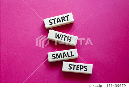 Steps symbol. Concept words Start with Small Steps on wooden blocks. Beautiful bright red background. Business and Start with Small Steps concept. Copy space. 136439679