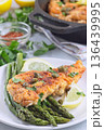 Delicious haddock fish piccata, battered fish fillet with capers, lemon and asparagus, vertical 136439995