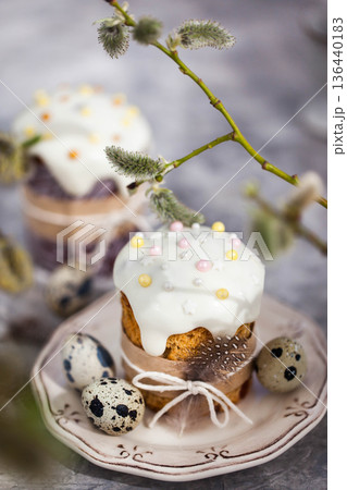 Sweet Easter bread, panettone or kulich and colorful painted eggs, Holiday spring concept 136440183