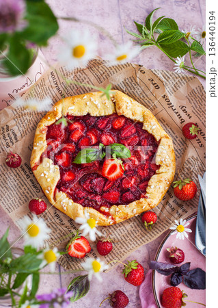 Rustic strawberry open sweet pie (galette) 136440194