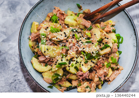 Asian style protein tuna cucmbers and green onion fresh salad Asian style protein tuna cucmbers and green onion fresh salad 136440244