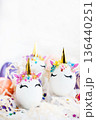Easter eggs in the form of a unicorn on white background, copy space for text, close-up 136440251