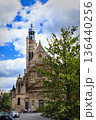 View of beautiful architecture and trees on summer streets in the city center of Paris, France 136440256