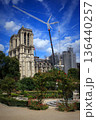 View of beautiful architecture and trees on summer streets in the city center of Paris, France 136440257