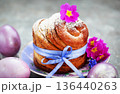 Sweet Easter bread, panettone or cruffin and colorful painted eggs, Holiday spring concept 136440263
