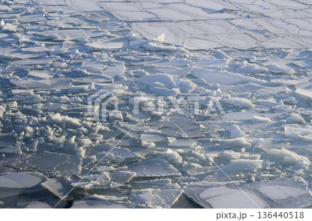 Ice Fragments Shimmer. Chilly Sea Ice Breaks Into Mosaic Structures Ice Fragments Shimmer. Chilly Sea Ice Breaks Into Mosaic Structures 136440518