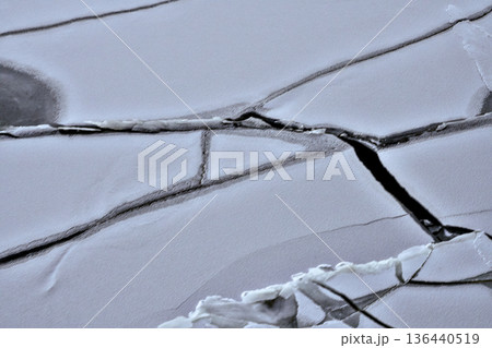 Ice Fragments Shimmer. Chilly Sea Ice Breaks Into Mosaic Structures Ice Fragments Shimmer. Chilly Sea Ice Breaks Into Mosaic Structures 136440519