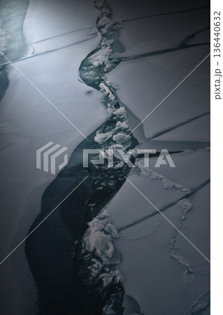 Ice Fragments Shimmer. Chilly Sea Ice Breaks Into Mosaic Structures Ice Fragments Shimmer. Chilly Sea Ice Breaks Into Mosaic Structures 136440632