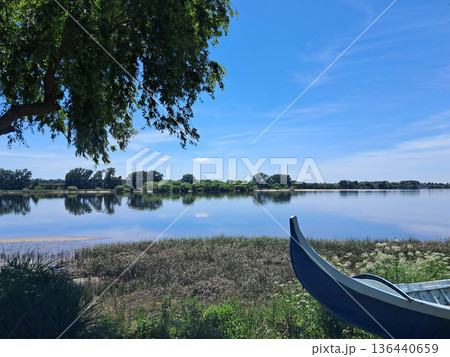 Horizon of the Tejo river in Portugal on a calm day Horizon of the Tejo river in Portugal on a calm day 136440659