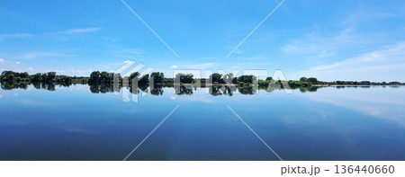 Horizon of the Tejo river in Portugal on a calm day Horizon of the Tejo river in Portugal on a calm day 136440660