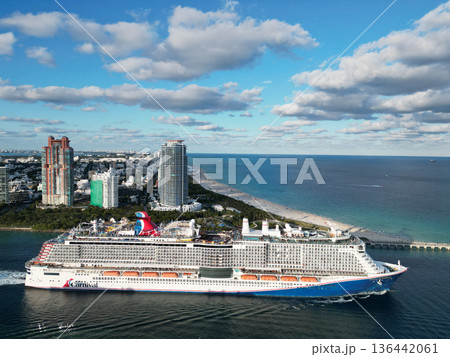 Miami, Florida, USA - November 24, 2024: Cruise ship vacation travel. Luxury liner. Carnival cruise line. Cruise ship vacation. Cruise ship in summer vacation leaving Miami port. Carnival celebration Miami, Florida, USA - November 24, 2024: Cruise ship vacation travel. Luxury liner. Carnival cruise line. Cruise ship vacation. Cruise ship in summer vacation leaving Miami port. Carnival celebration 136442061