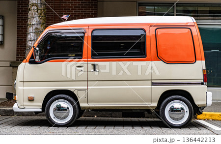 Seattle, USA - July 22, 2024: Volkswagen Transporter T2 Microbus car vehicle, side view. Vintage Volkswagen Transporter in street. Retro Microbus of Volkswagen Transporter T2. Volkswagen dealership Seattle, USA - July 22, 2024: Volkswagen Transporter T2 Microbus car vehicle, side view. Vintage Volkswagen Transporter in street. Retro Microbus of Volkswagen Transporter T2. Volkswagen dealership 136442213