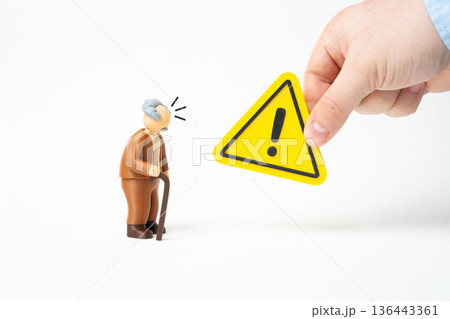 A problem for an elderly man. A warning for a pensioner. Awareness and protection from threatening factors. Alarming news. Prevention and guidance reduce risks. 136443361