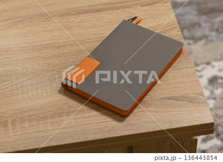 Bright, fancy notebook on the table 136443854