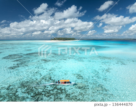 Aerial view of colorful boats and yachts in transparent water Aerial view of colorful boats and yachts in transparent water 136444870