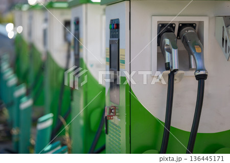 Public electric car charging stations in a row. 136445171