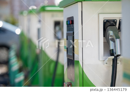 Close-up of an electric vehicle charging station 136445179