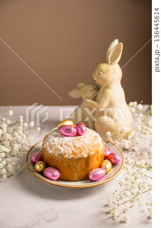 Easter cake with chocolate easter eggs and gypsophila flowers. Spring holidays Easter cake with chocolate easter eggs and gypsophila flowers. Spring holidays 136445614