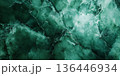 Emerald green marble background with dark and light veining, polished jade stone texture, deep natural elegance. 136446934